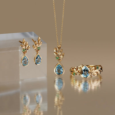 135E1858-01-9K-Yellow-Gold-Sky-Blue-Topaz-and-Tsavorite-Olive-Branch-Drop-Earrings