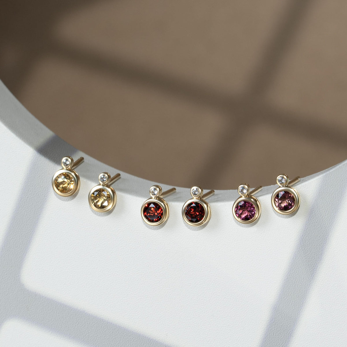 135E1920-08-Modern-Classic-9K-Yellow-Gold-Round-Garnet-&-Diamond-Stud-Earrings