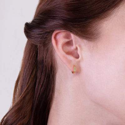Silver peridot huggie hoop earrings